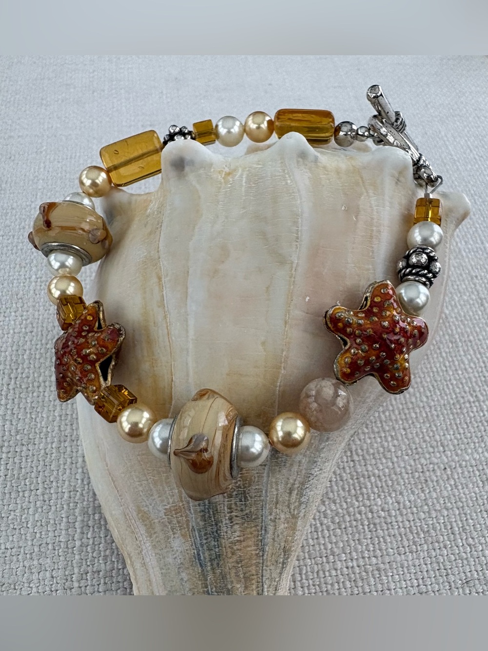 7 1/2 Inch Handcrafted Bracelet. Bali, silver, Swarovski crystals & pearls.